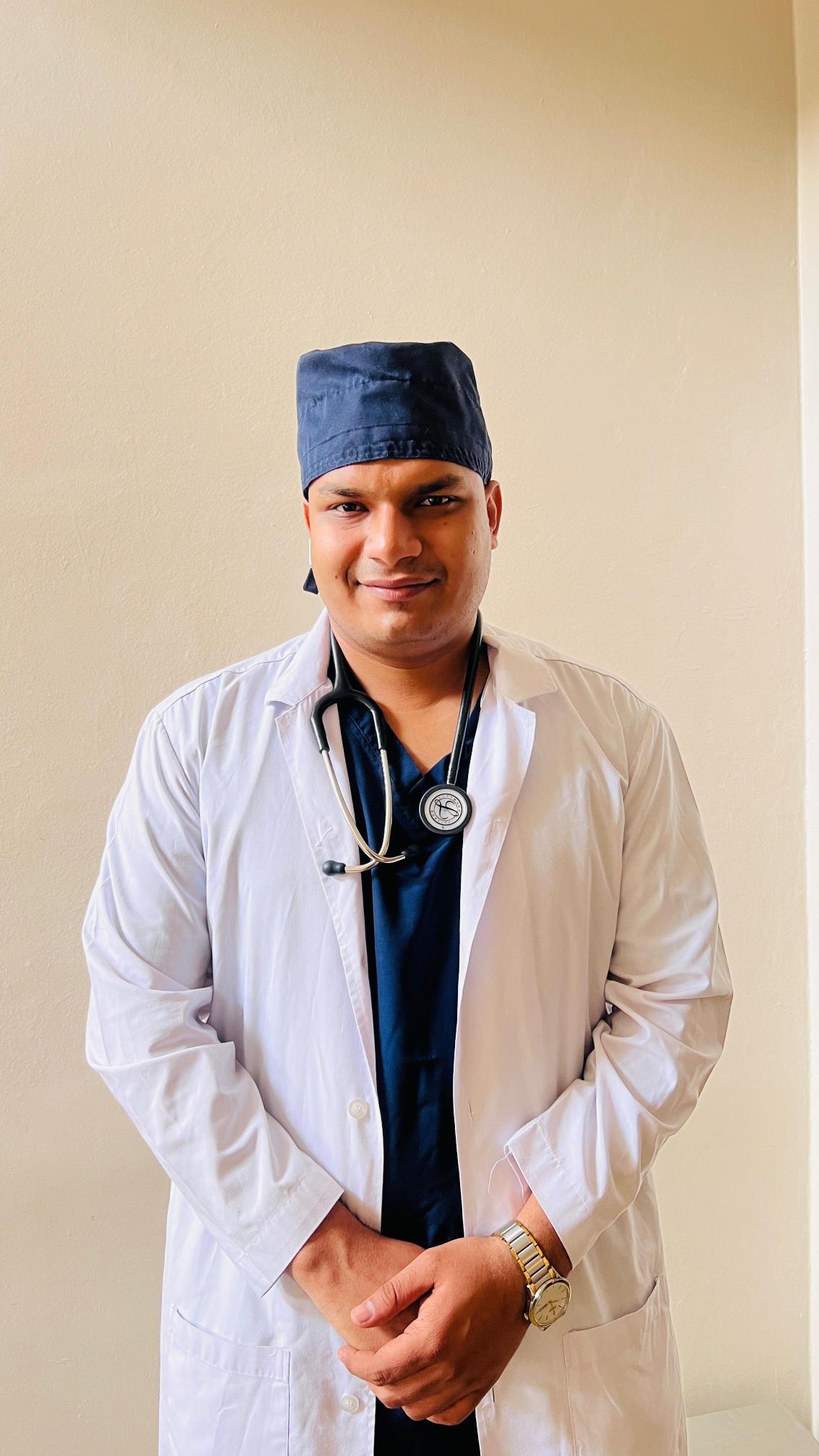 Portrait of Dr. Anil Sharma in a white coat